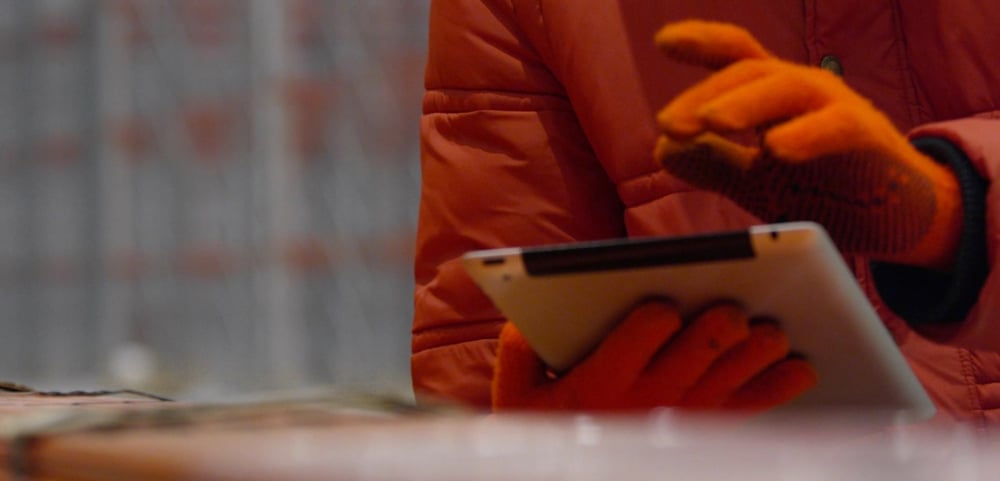 Worker using tablet for his work