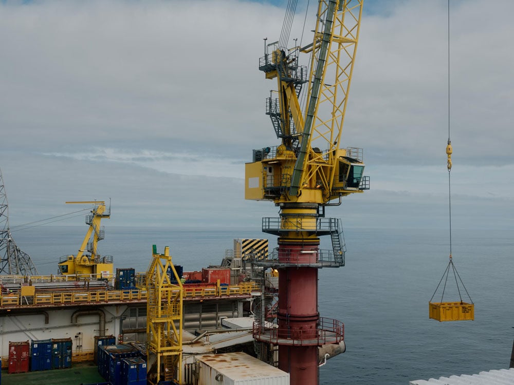 Crane lifting a load offshore